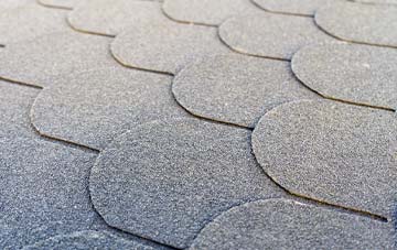 Tore asphalt roofing costs